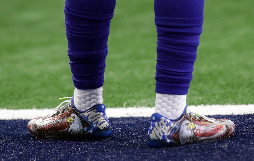 ARLINGTON, TX - SEPTEMBER 11: Odell Beckham #13 of the New York Giants wears 9/11 cleats as a tribute for the 15th anniversary of September 11th before a game against the Dallas Cowboys at AT&T Stadium on September 11, 2016 in Arlington, Texas. (Photo by Ronald Martinez/Getty Images)
