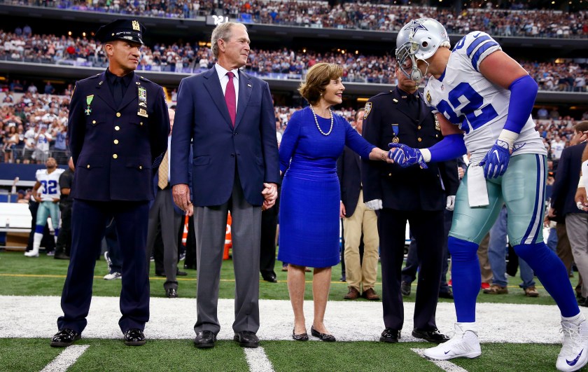 ARLINGTON, TX - SEPTEMBER 11: Jason Witten #82 of the Dallas Cowboys greets former First Lady Laura Bush and former U.S. President George W. Bush prior to the game against the New York Giants at AT&T Stadium on September 11, 2016 in Arlington, Texas. (Photo by Tom Pennington/Getty Images)