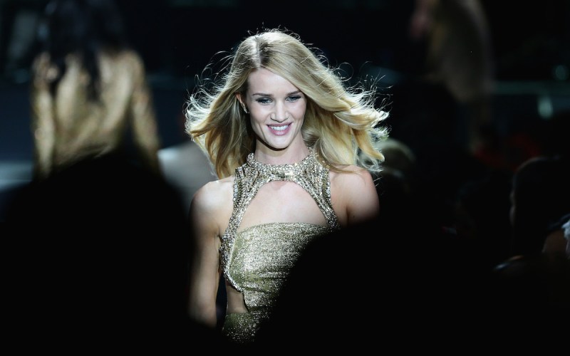 CAP D'ANTIBES, FRANCE - MAY 23: Rosie Huntington-Whiteley walks the runway at amfAR's 20th Annual Cinema Against AIDS during The 66th Annual Cannes Film Festival at Hotel du Cap-Eden-Roc on May 23, 2013 in Cap d'Antibes, France. (Photo by Vittorio Zunino Celotto/French Select via Getty Images)
