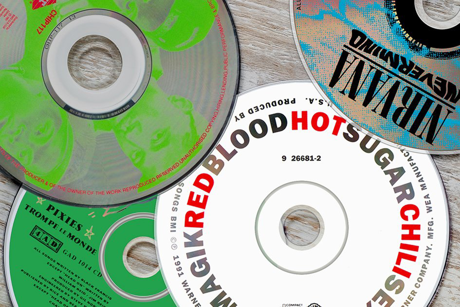 Photo illustration of CDs from Nirvana, the Red Hot Chili Peppers and other bands that released albums on Sept. 24, 1991