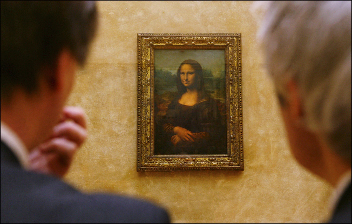 FRANCE - APRIL 06:  Leonardo da Vinci's masterpiece, Mona Lisa in her new setting in the refurbished Salle des Etats where the public was able to rediscover her in Paris, France on April 06th, 2005.  (Photo by Raphael GAILLARDE/Gamma-Rapho via Getty Images)