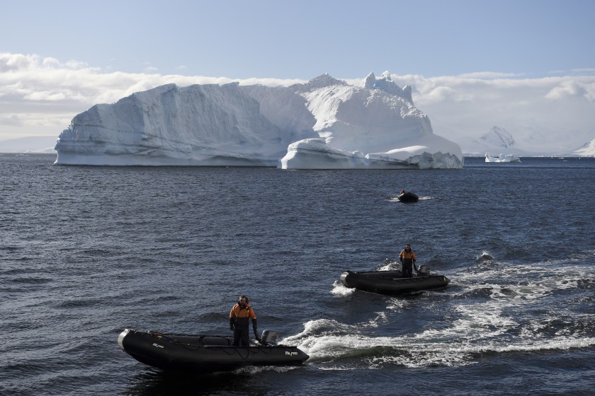 Researchers look out over the Ross Sea (Eitan Abramovich/AFP)