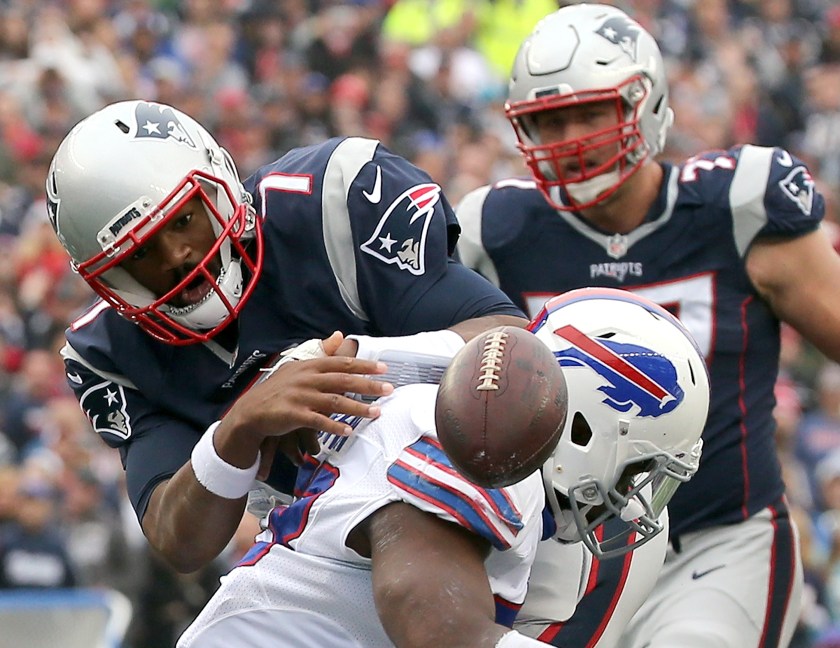 Jacoby Brissett #7 of the New England Patriots fumbles the ball as he is hit by Zach Brown #53 Buffalo Bills in the first half at Gillette Stadium on October 2, 2016 in Foxboro, Massachusetts. (Jim Rogash/Getty Images)
