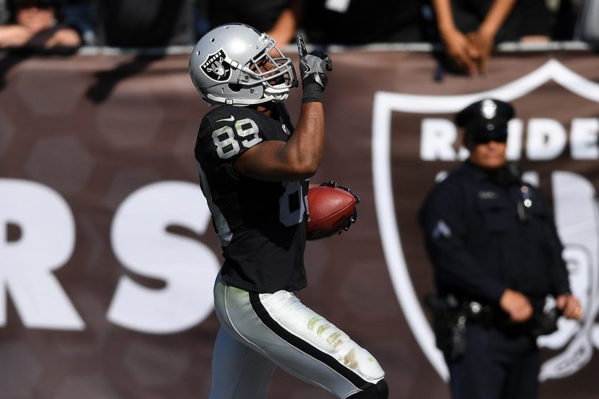 Amari Cooper #89 of the Oakland Raiders scores a 64-yard touchdown against the San Diego Chargers during their NFL game at Oakland-Alameda County Coliseum on October 9, 2016 in Oakland, California. (Thearon W. Henderson/Getty Images)