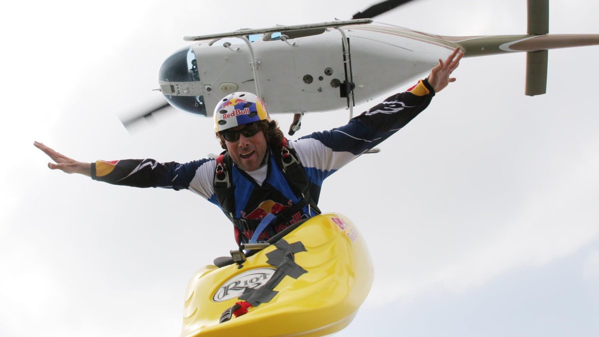 Skyaker Miles Daisher 'Skyaks' out of a helicopter in Mexico. Danger man Miles Daisher casts a bizarre image paddling across the sky - 13,000 feet up in a kayak. The daredevil has turned extreme sport skydiving on its head after deciding to jump out of a plane in equipment normally used only in water - giving birth to 'skyaking'.  (John Charles Colclasure / Barcroft Media / Getty Images)