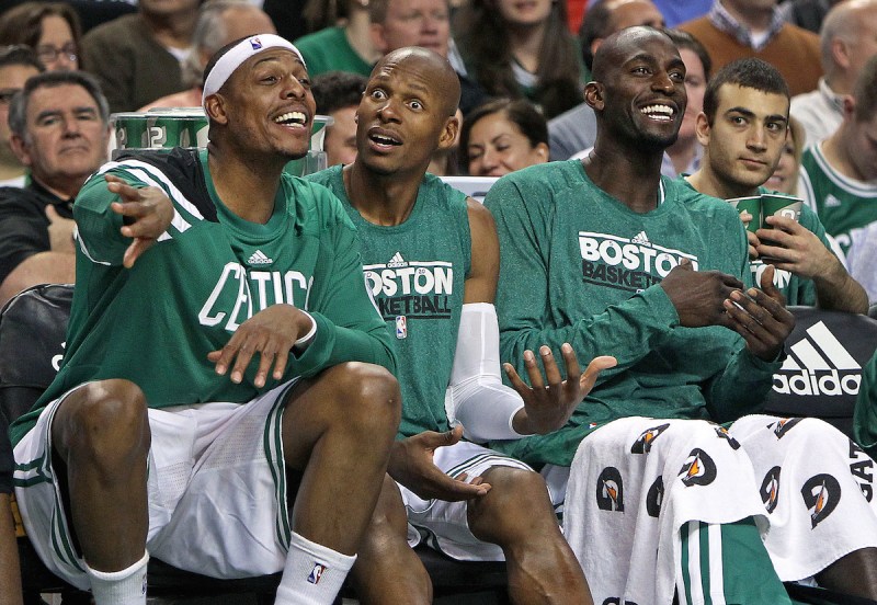 12-30-11: Boston, MA: The Celtics finally broke into the win column tonight, which allowed (left to right) Paul Pierce, Ray Allen and Kevin Garnett to have some fun on the bench during the fourth quarter. The Boston Celtics hosted the Detroit Pistons in an NBA regular season game at the TD Garden, the team's home opener (Globe Staff Photo/Jim Davis) section:sports topic:Celtics-Pistons