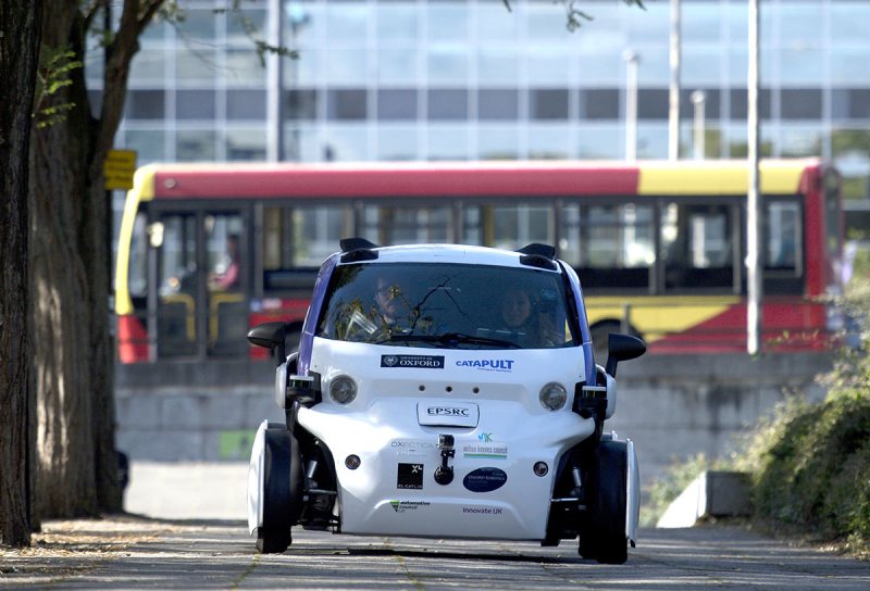 An autonomous self-driving vehicle, as pictured as it is tested in a pedestrianised zone, during a media event in Milton Keynes, north of London, on October 11, 2016. Driverless vehicles carrying passengers took to Britain's streets for the first time on Tuesday in a landmark trial which could pave the way for their introduction across the country. The compact two-seater cars trundled along a pedestrianised zone in Milton Keynes, north of London, in a trial by Transport Systems Catapult (TSC) which plans to roll out 40 vehicles in the city. / AFP / JUSTIN TALLIS (Photo credit should read JUSTIN TALLIS/AFP/Getty Images)