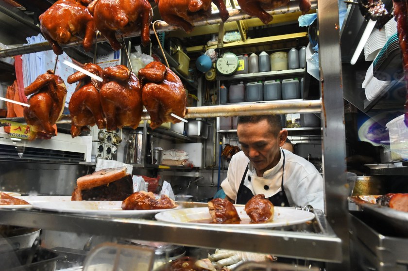 Chef Chan Hon Meng at his stall in Singapore (Roslan Rahman/AFP)