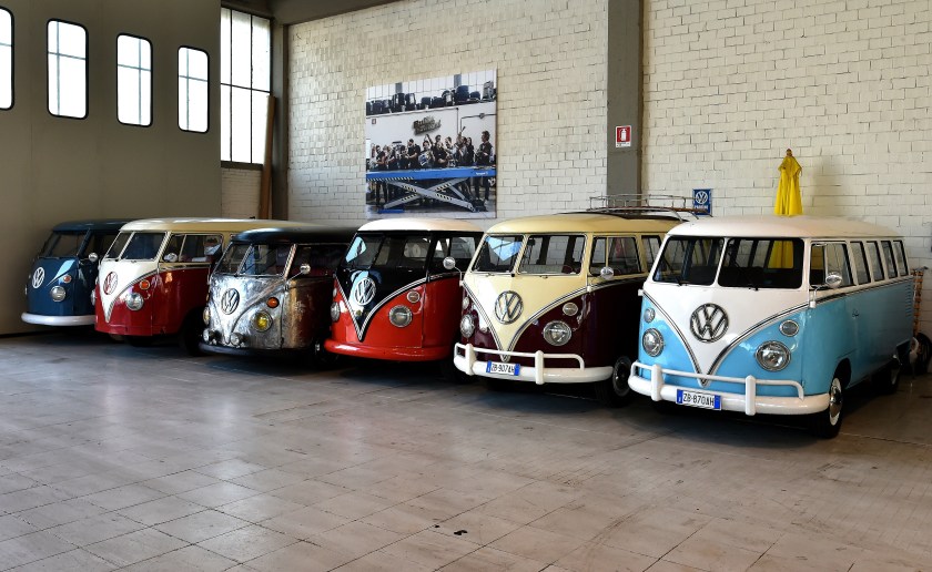 Vintage Volkswagen Kombi bus (van, transporter or camper) are parked in a garage after being completly restored by mechanics of the "T1 specialist" company, on November 3, 2016 in Florence. Campers like the legendary VW Bulli, Samba or Splitties, sometimes come from Brazil in poor condition and reborn at the garage Nucci in Florence. (Alberto Pizzoli/AFP Photo)