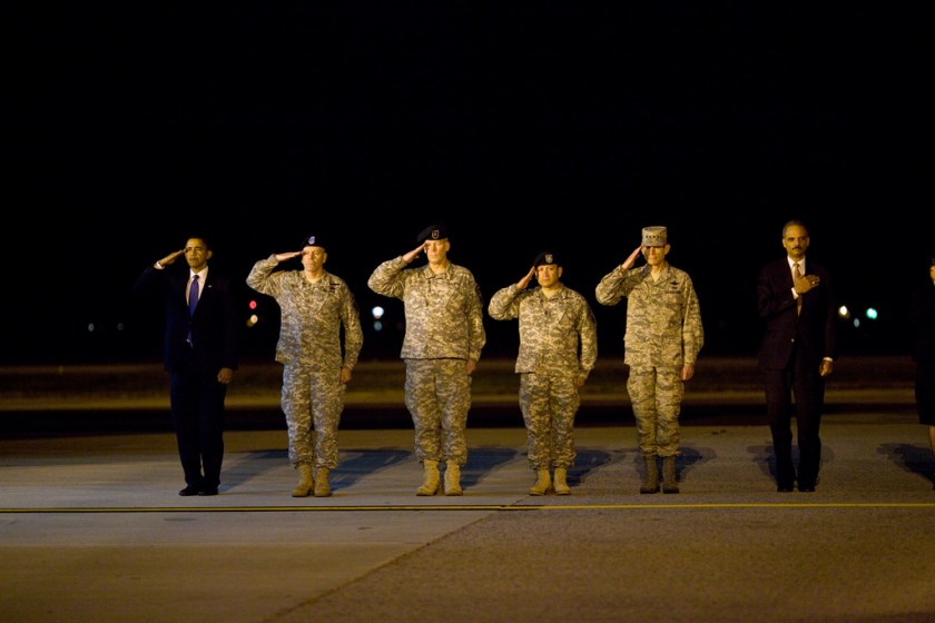 “This photo was taken about 4AM after the President made an unannounced trip to Dover Air Force Base to pay respects to fallen troops coming back from Afghanistan. After meeting privately with the families, the President walked alone up the ramp of the cargo plane carrying the 18 caskets, all draped in American flags. I could see the emotion on his face as he walked from casket to casket, leaving a Presidential coin on each. When he was done, he paused for a few minutes, head bowed in prayer. I heard him tell others later how that was the most difficult moment of his Presidency thus far. Out of respect for the families, not all of who wanted their ceremony photographed, we can’t show those pictures (but they will become part of Presidential archive.) (Official White House photo by Pete Souza) 