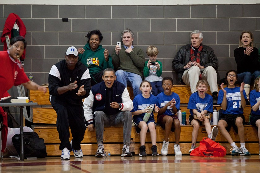 "The two coaches for Sasha Obama's basketball team couldn't make it to one of her games, so the President and his then personal aide, Reggie Love, filled in as coaches for this game one Saturday. Here they along with Sasha's teammates react during the game." (Official White House Photo by Pete Souza)