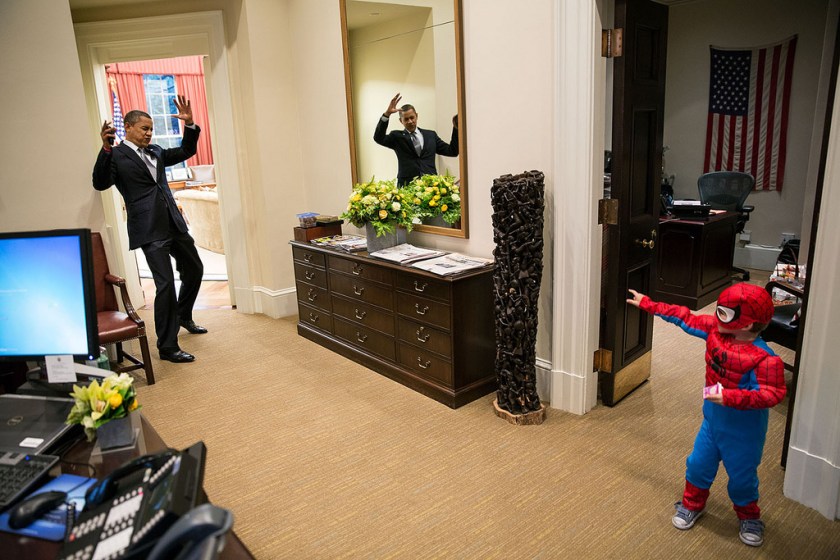 "The President pretends to be caught in Spider-Man's web as he greets Nicholas Tamarin, 3, just outside the Oval Office. Spider-Man had been trick-or-treating for an early Halloween with his father, White House aide Nate Tamarin in the Eisenhower Executive Office Building. I can never commit to calling any picture my favorite, but the President told me that this was HIS favorite picture of the year when he saw it hanging in the West Wing a couple of weeks later." (Official White House Photo by Pete Souza)