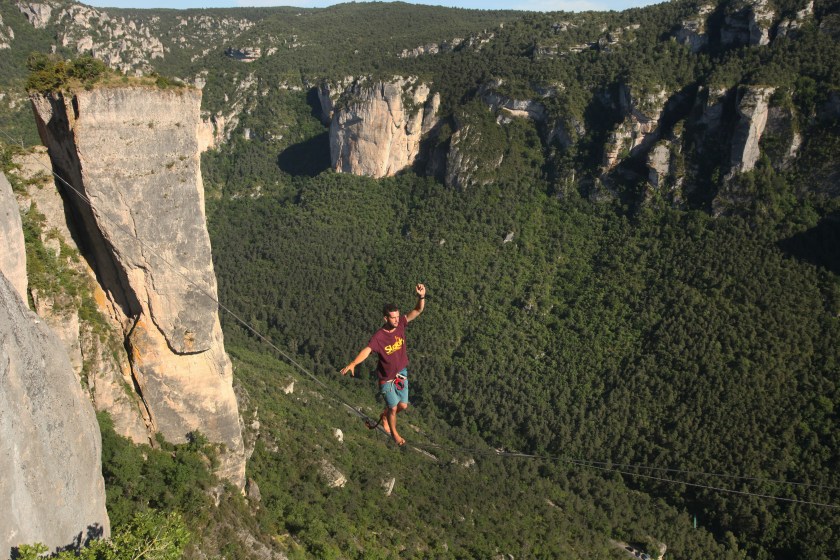 Nathan Paulin of France, holder of the world record of highline, walks on highline rigged between cliffs at Gorges de la Jonte in Cevennes National Park. (Patrick Aventurier/Getty Images)