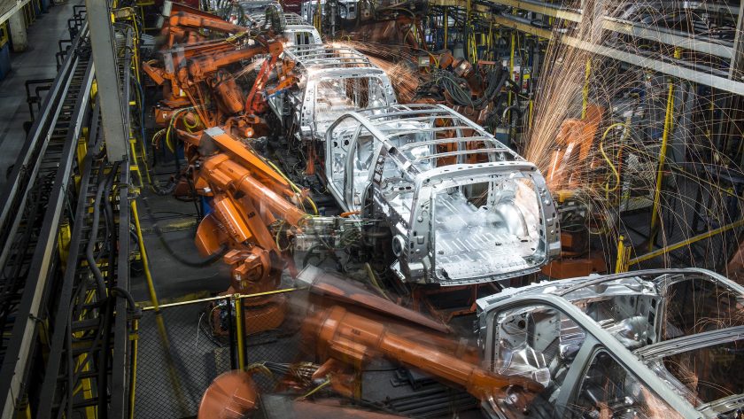 Robotic machines weld together the frames of sports utility vehicles (SUV) during production at the General Motors Co. (GM) assembly plant in Arlington, Texas, U.S., on Thursday, March 10, 2016. (Matthew Busch/Bloomberg via Getty Images)