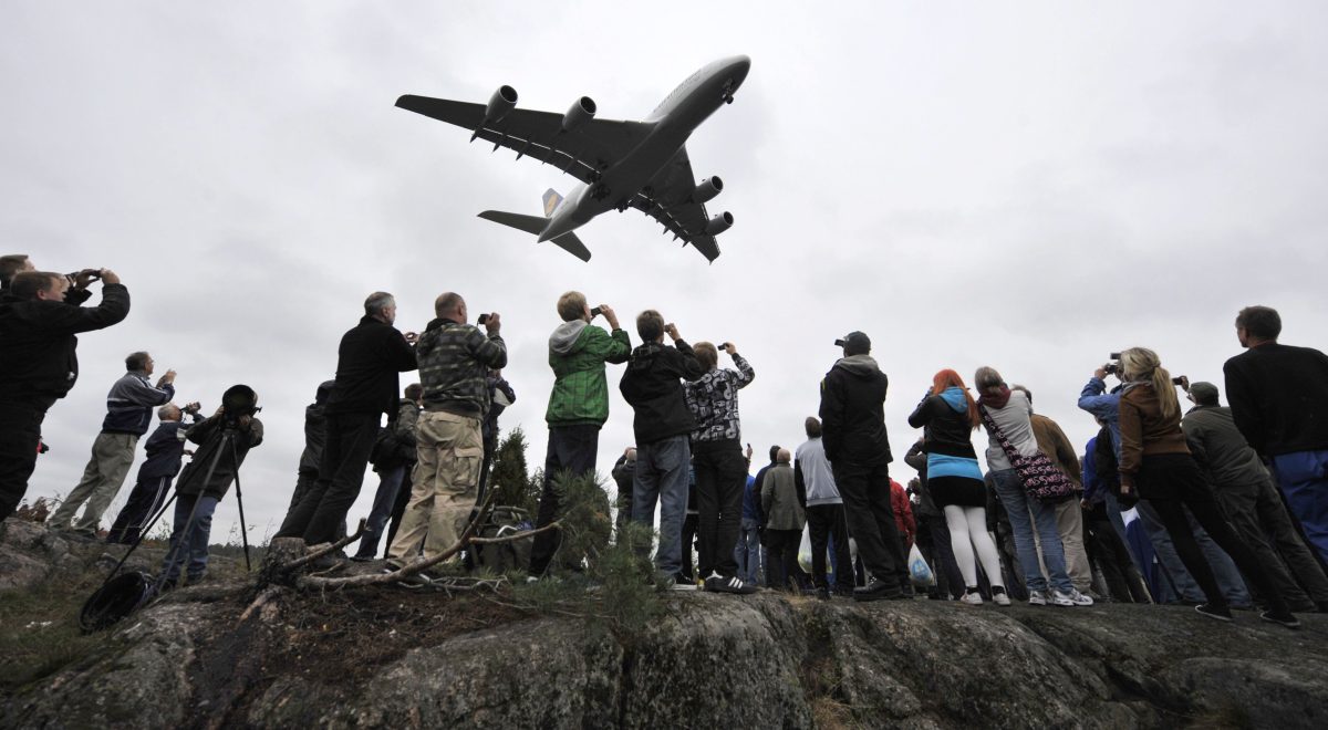 People watch a Lufthansa Airbus-380, the world's largest airliner with a capacity of 526 passengers, at the Helsinki-Vantaa Airport, on September 15, 2010. (Jussi Nukari/AFP/Getty Images)