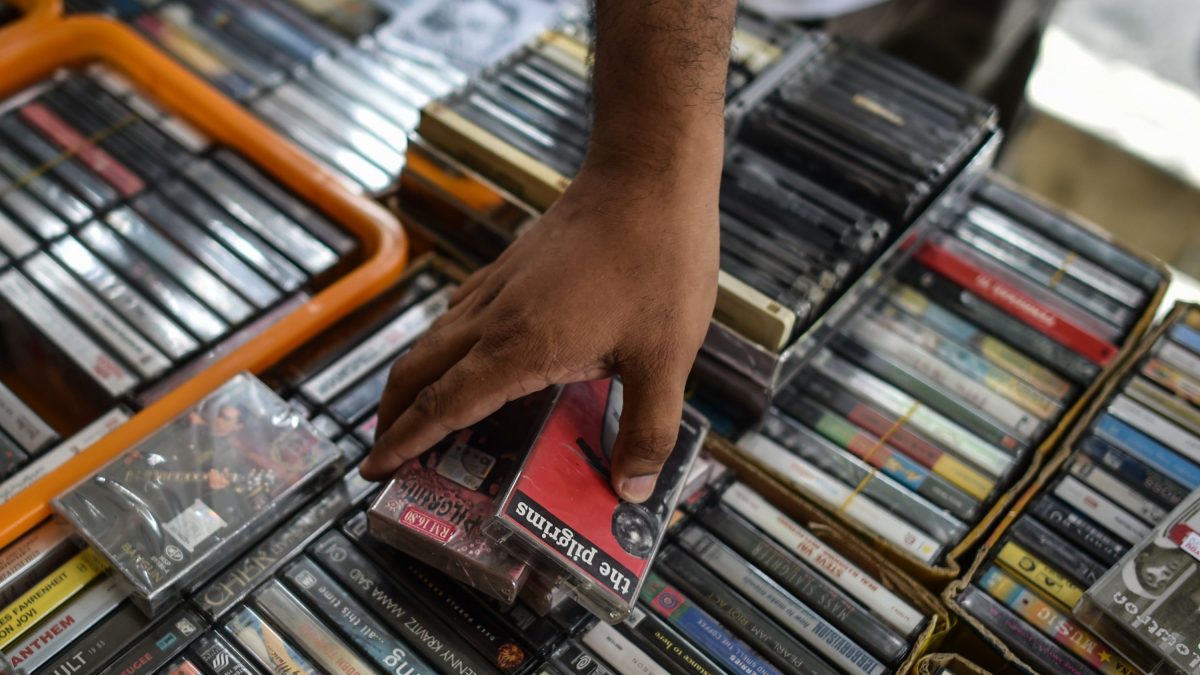 This picture taken on October 8, 2016 shows a collector browsing audio cassettes during "International Cassette Store Day" in Subang Jaya, on the outskirts of Kuala Lumpur. (Mohd Rasfan/AFP/Getty Images)