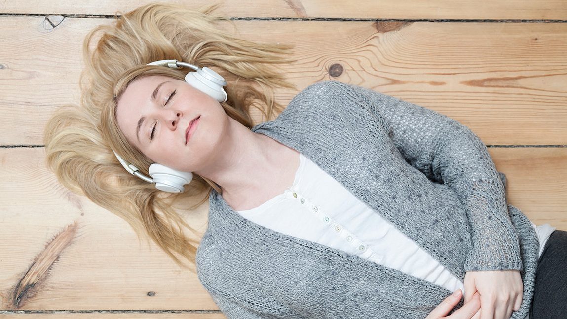 Woman Relaxing with Headphones on