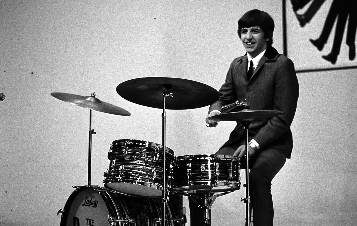 Photo of Ringo STARR and BEATLES; Ringo Starr performing onstage, on the set of 'A Hard Day's Night' at the Scala Theatre, playing Ludwig drum kit, drums (Ulf Kruger OHG/Redferns)