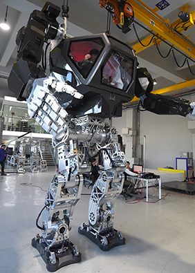 Engineers test a 13-foot-tall humanoid manned robot dubbed Method-2 in a lab of the Hankook Mirae Technology in Gunpo, south of Seoul, on December 27, 2016.
The giant human-like robot bears a striking resemblance to the military robots starring in the movie "Avatar" and is claimed as a world first by its creators from a South Korean robotic company.  (JUNG YEON-JE/AFP/Getty Images)
