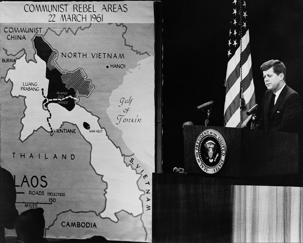 President Kennedy during a 1961 press conference that involved a CIA map showing the distribution of rebel actors in Vietnam. (Central Intelligence Agency)