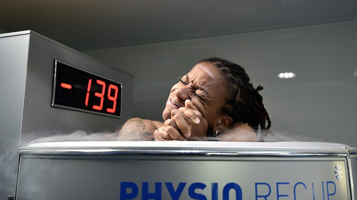 France's midfielder Elodie Thomis reacts as she undergoes treatment in a medical device used for cryotherapy at the French national football team training base in Clairefontaine-en-Yvelines, on May 11, 2015, during preparations for the upcoming FIFA 2015 Women's World Cup. AFP PHOTO / FRANCK FIFE

--FRANCE OUT--        (Photo credit should read FRANCK FIFE/AFP/Getty Images)