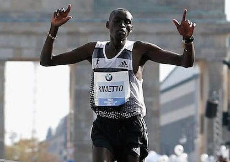 BERLIN, GERMANY - SEPTEMBER 28: Dennis Kimetto of Kenya crosses the finish line in new world record time during the 41th BMW Berlin Marathon on September 28, 2014 in Berlin, Germany. (Photo by Boris Streubel/Bongarts/Getty Images)