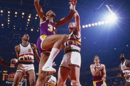 Los Angeles Lakers' center Kareem Abdul-Jabbar #33 jumps for a layup during a game against the Denver Nuggets circa the 1980's in Denver, Colorado. (Focus on Sport/Getty Images)