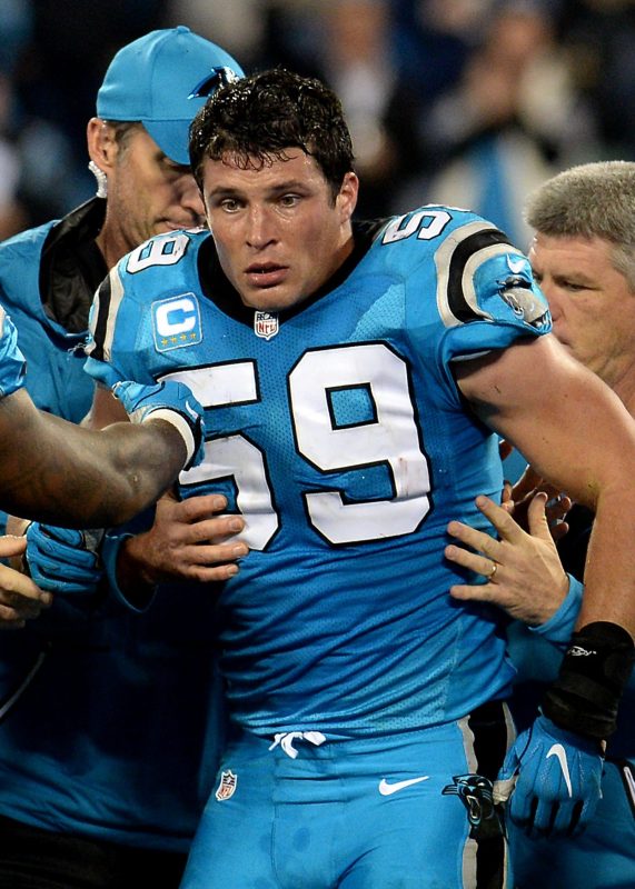 Carolina Panthers linebacker Luke Kuechly (59) is helped onto a cart after being injured in the fourth quarter against the New Orleans Saints at Bank of America Stadium in Charlotte, N.C., on Thursday, Nov. 17, 2016. (Jeff Siner/Charlotte Observer/TNS via Getty Images)