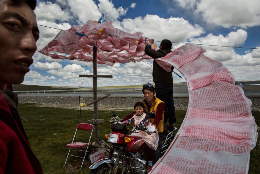 Tibetan nomads face many challenges to their traditional way of life including political pressures, forced resettlement by China's government, climate change and rapid modernization. The Tibetan Plateau, often called "the Roof of the World," is the world's highest and largest plateau. (Kevin Frayer/2016 Sony World Photography Awards)