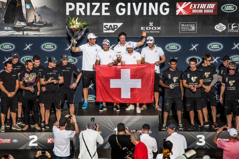 Second placed SAP Extreme (L) of Denmark, event winners Alinghi (C) of Switzerland and third placed Oman Air of Oman on the podium during the final day of the eighth and final act of the Extreme Sailing Series in Sydney, Australia on December 11, 2016. (Dean Treml/Red Bull Content Pool) 