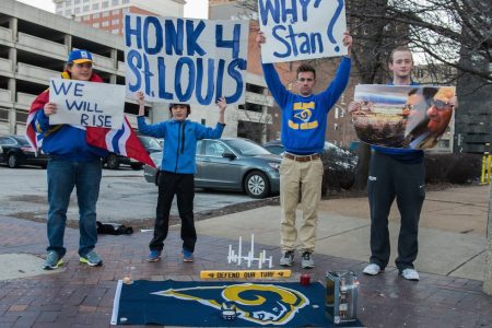 Football fans gather outside the Edward Jones Dome to protest the NFL's decision to allow Rams owner Stan Kroenke to move the team to Los Angeles. (Photo by James A. Cooper/Corbis via Getty Images)
