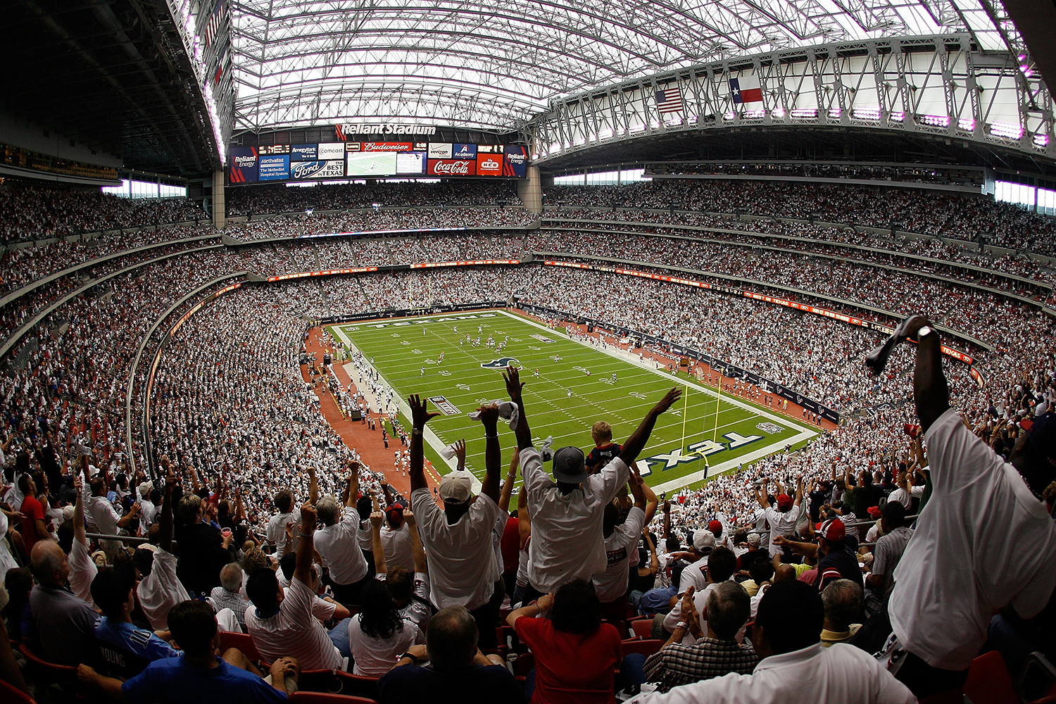 Fans celebrate a touchdown at NRG Stadium, formerly Reliant Stadium, in Houston, Texas. (Chris Graythen/Getty Images)