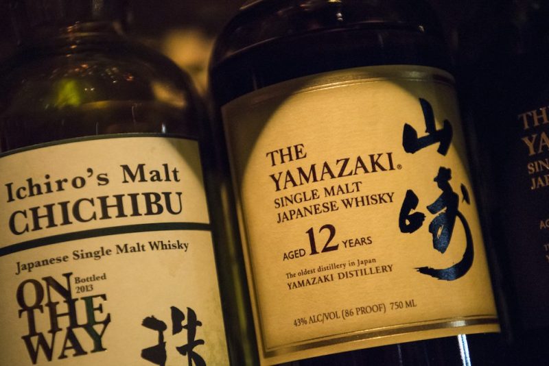Bottles of Ichiro's Malt brand whisky and Yamazaki Distillery single malt whiskey stand on a shelf at the Nihon Whisky Lounge in San Francisco, California, U.S., on Tuesday, March 29, 2016. Malt imports in Japan jumped 20 percent last year and have almost quadrupled over the past decade, spurred by demand for Japanese whiskies from San Francisco to Hong Kong. Photographer: Photographer: David Paul Morris/Bloomberg