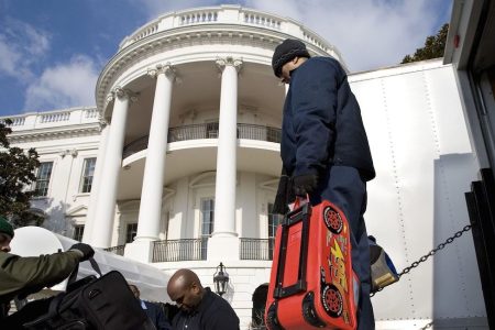 WASHINGTON - JANUARY 20:  *** EXCLUSIVE *** While Barack Obama is being sworn in as the 44th president of the United States of America at the U.S. Capitol, his family's possessions, including one of his daughter's bags, are unloaded from moving trucks and put in place in the White House living quarters on January 20, 2009 in Washington, DC. Obama leads as the first African-American president of the U.S. (Photo by David Hume Kennerly/Getty Images)
