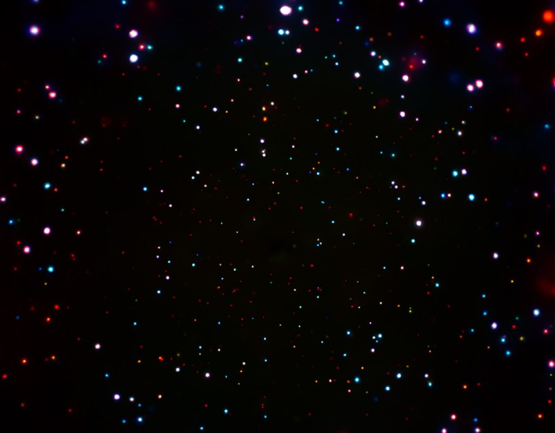 Made with over 7 million seconds of Chandra observing time, this image is part of the Chandra Deep Field-South (CDF-S) and is the deepest X-ray image ever obtained. In this image, low, medium, and high-energy X-rays that Chandra detects are shown as red, green, and blue respectively (NASA/CXC/Penn State/B.Luo et al.)