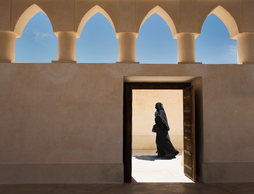 A woman exiting a Mosque in Doha, Qatar (Getty Images)