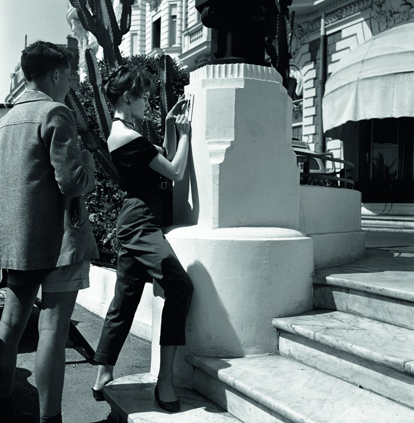 Brigitte Bardot, a delight for the photographer, even when she signs her photograph for a young boy at the Cannes Film Festival in 1956. (Riviera Cocktail, Edward Quinn - Côte d'Azur Jet Set of the 1950s, Small Format Edition, to be published by teNeues)