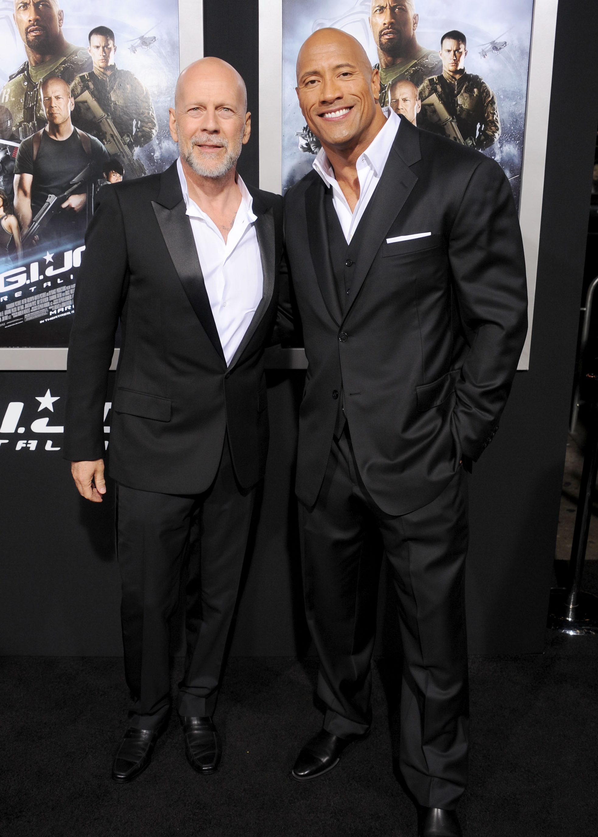 HOLLYWOOD, CA - MARCH 28: Actors Bruce Willis and Dwayne Johnson arrive at the "G.I. Joe: Retaliation" Los Angeles premiere at TCL Chinese Theatre on March 28, 2013 in Hollywood, California. (Photo by Gregg DeGuire/WireImage)