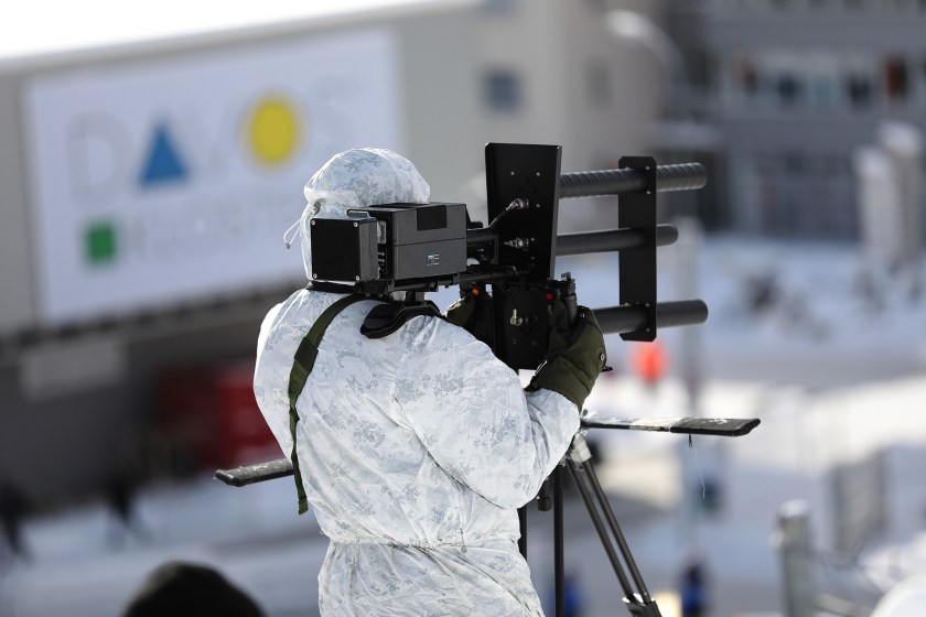 A member of a police unit practices using an anti-drone gun as part of the security exercises ahead of the World Economic Forum (WEF) in Davos, Switzerland, on Monday, Jan. 16, 2017. (Simon Dawson/Bloomberg via Getty Images)