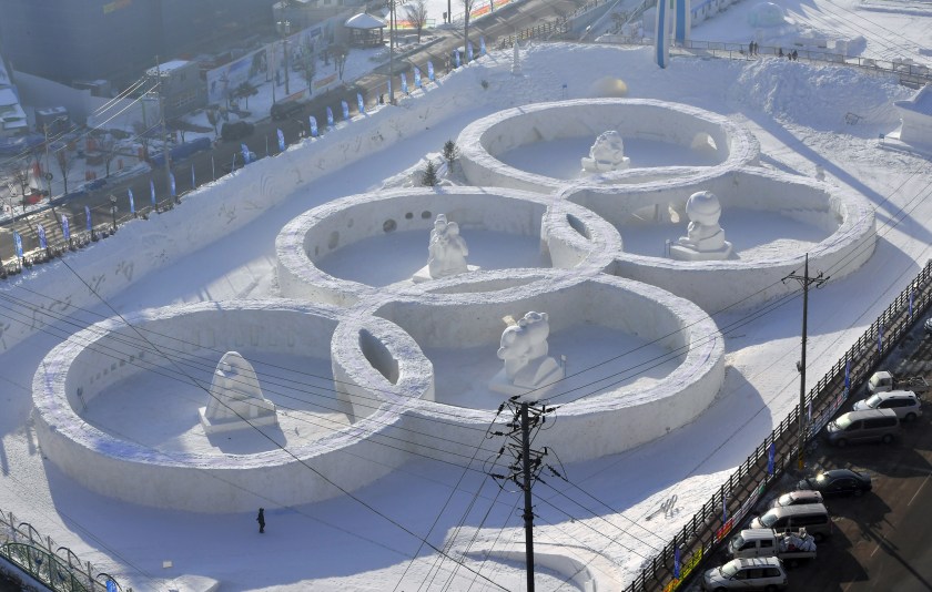 TOPSHOT - This photo taken February 4, 2017 shows the snow sculpture shaped of the Olympic rings at the town of Hoenggye, near the venue for the opening and closing ceremonies for the upcoming Pyeongchang 2018 Winter Olympic Games, in Pyeongchang. / AFP / JUNG Yeon-Je (Photo credit should read JUNG YEON-JeAFP/Getty Images)