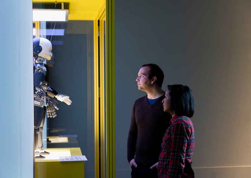 Visitors looking at iCub (Plastiques Photography, courtesy of the Science Museum)