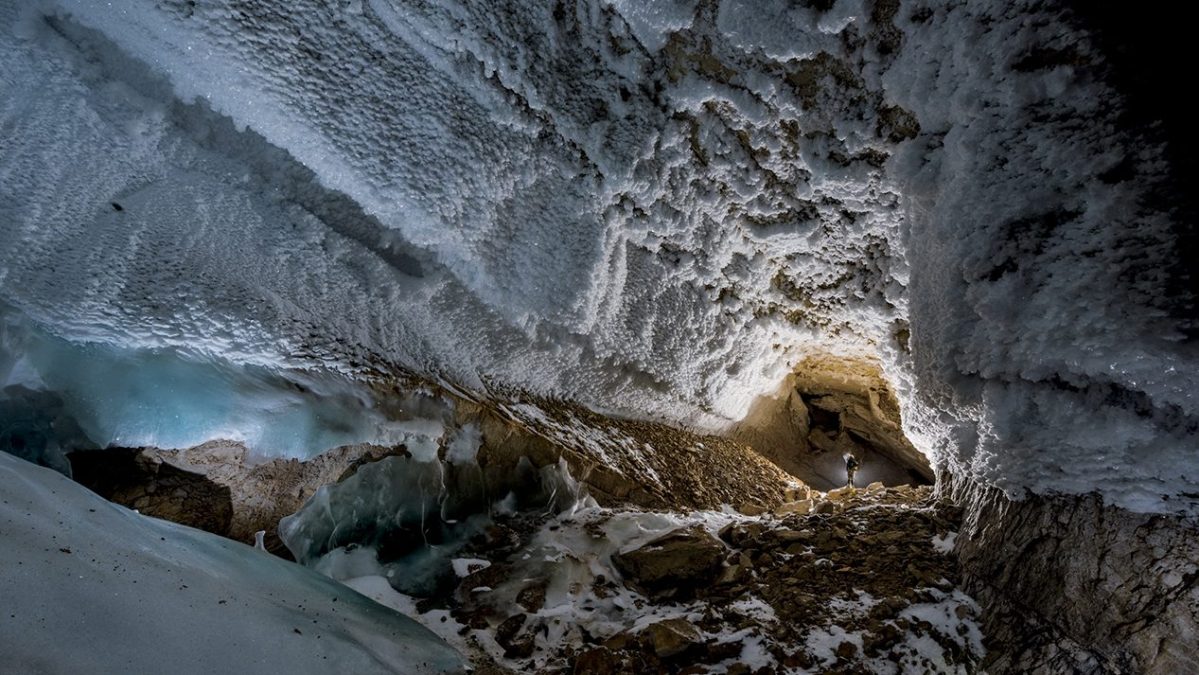 Ice crystals populate Full Moon Hall. The chamber, 820 feet long, is the largest yet discovered in Dark Star. The entire cave system is a geological time capsule: Mineral deposits reveal millennia of climate history. (Robbie Shone/National Geographic)