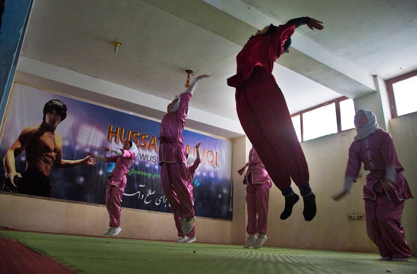 Shaolin martial arts students practice at their club in Kabul, Afghanistan, Tuesday, Jan. 25, 2017. When they aren’t training on the snow covered hills that surround Kabul, the students train in the grungy, dark club financed by a young cinema actor. (AP Photos/Massoud Hossaini)