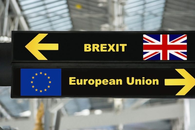 Brexit or british exit on airport sign board with blurred background. Brexit concept.