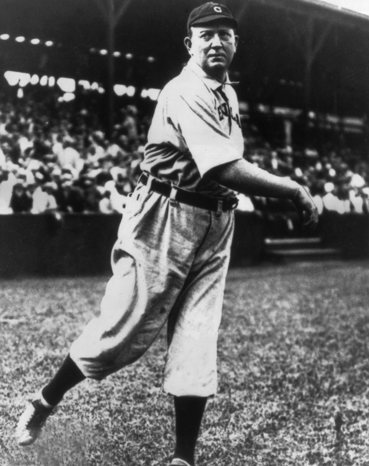 circa 1910:  Full-length portrait of American baseball player Cy Young (1867 - 1955), pitcher for the Cleveland Naps, lightly tossing a ball during warm-ups while wearing his uniform.  (Photo by Photo File/Getty Images)