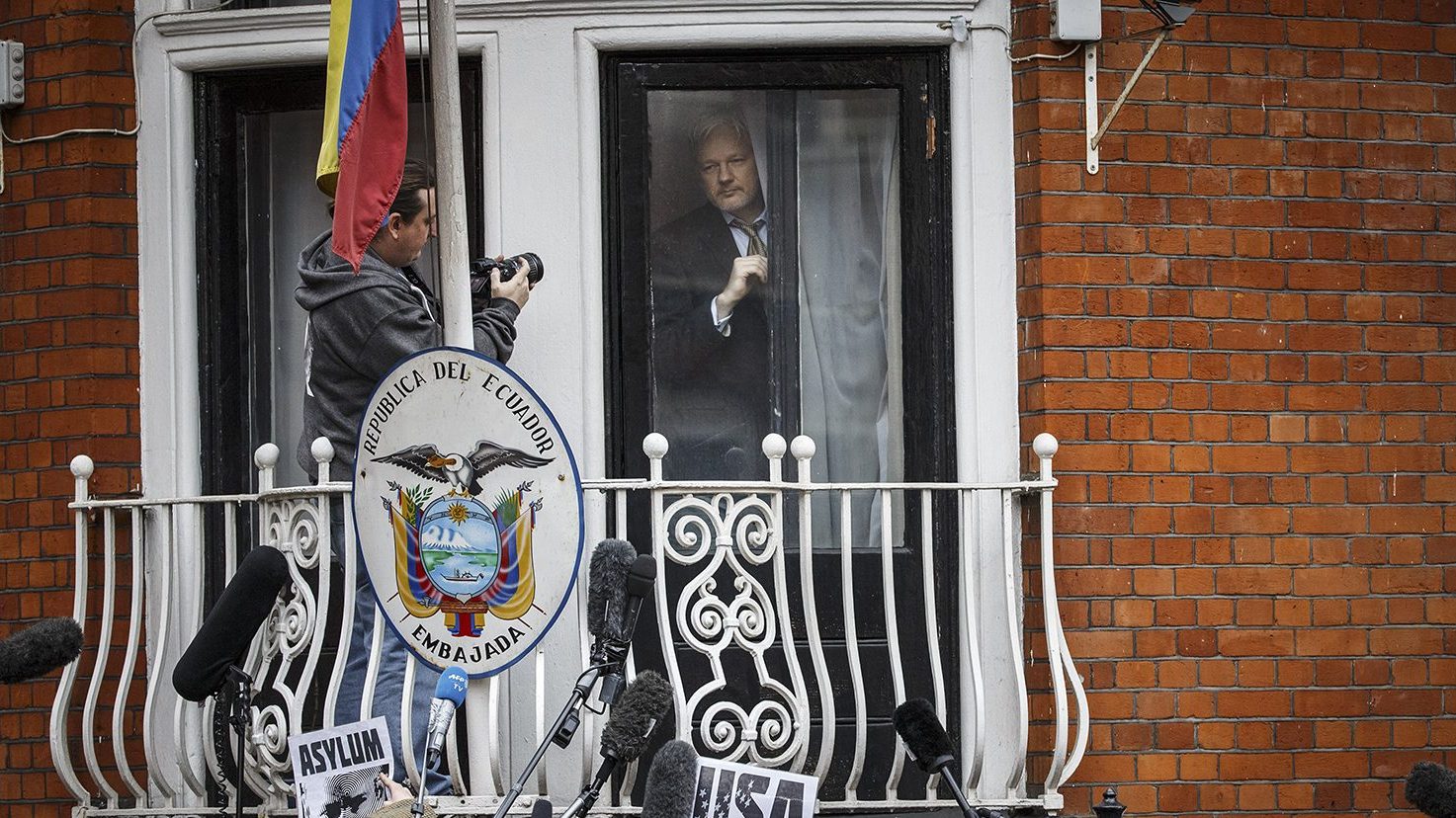 Wikileaks founder Julian Assange prepares to speak from the balcony of the Ecuadorian embassy where he continues to seek asylum following an extradition request from Sweden in 2012, on February 5, 2016 in London, England. The United Nations Working Group on Arbitrary Detention has insisted that Mr Assange's detention should be brought to an end. (Tolga Akmen/Anadolu Agency/Getty Images)