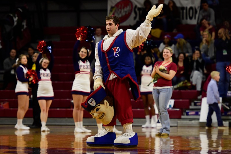 PHILADELPHIA, PA - FEBRUARY 12: Erik Tepper, a senior Penn student, one of four mascot-bearers to adorn the Quaker costume throughout the year, says farewell during in his final home game against the Cornell Big Red during the second half at The Palestra on February 12, 2017 in Philadelphia, Pennsylvania. The Quakers won 82-63. (Photo by Corey Perrine/Getty Images)