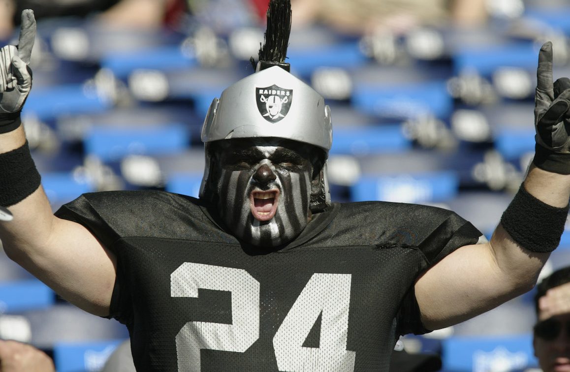 SAN DIEGO - JANUARY 26:  A fan of Charles Woodson #24 and the Oakland Raiders cheers before the Super Bowl XXXVII against the Tampa Bay Buccaneers at Qualcomm Stadium on January 26, 2003 in San Diego, California.  The Buccaneers won 48-21.  (Photo by Donald Miralle/Getty Images)