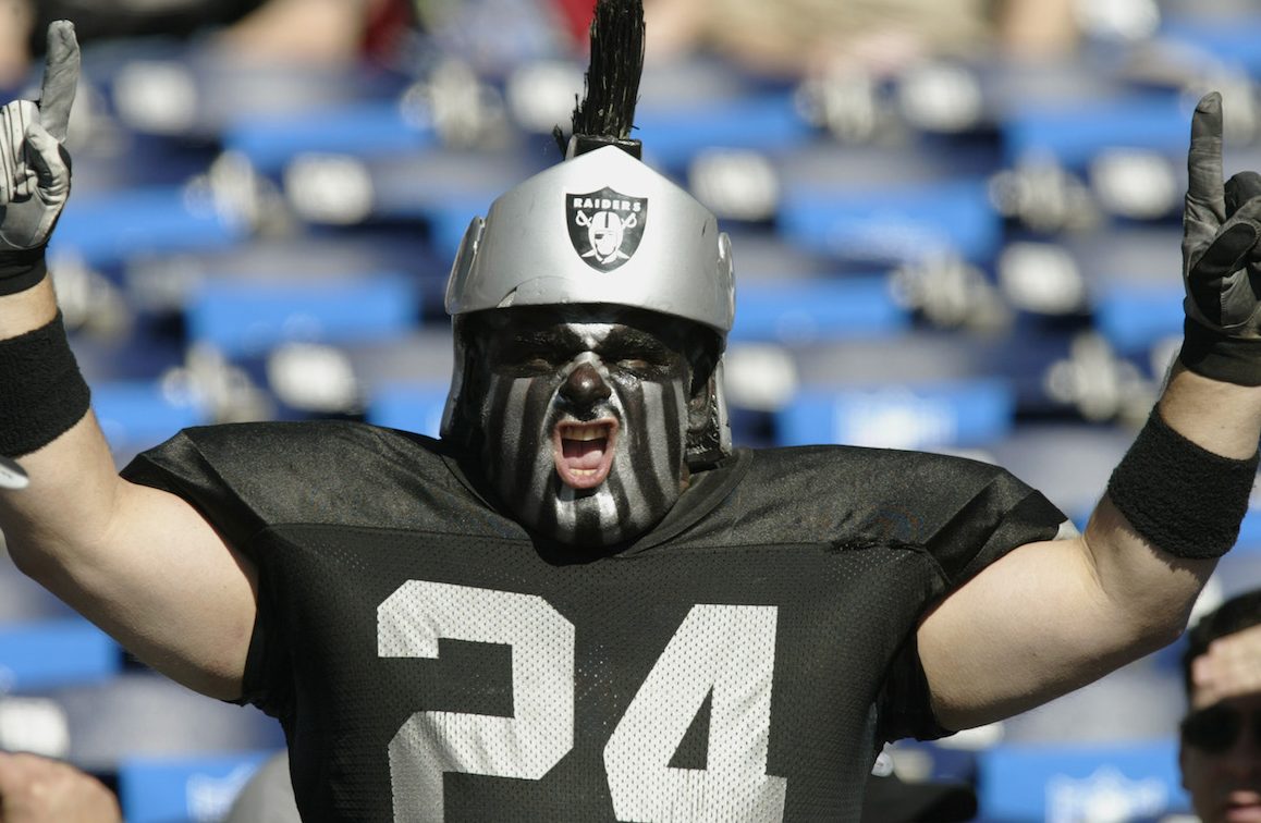 SAN DIEGO - JANUARY 26: A fan of Charles Woodson #24 and the Oakland Raiders cheers before the Super Bowl XXXVII against the Tampa Bay Buccaneers at Qualcomm Stadium on January 26, 2003 in San Diego, California. The Buccaneers won 48-21. (Photo by Donald Miralle/Getty Images)