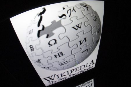 The "Wikipedia" logo is seen on a tablet screen on December 4, 2012 in Paris. AFP PHOTO / LIONEL BONAVENTURE        (Photo credit should read LIONEL BONAVENTURE/AFP/Getty Images)
